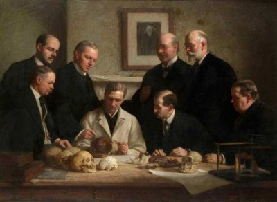 A portrait painted by John Cooke in 1915 showing scientists involved in the Piltdown man case: F. O. Barlow, G. Elliot Smith, Charles Dawson, Arthur Smith Woodward. Front row: A. S. Underwood, Arthur Keith, W. P. Pycraft, and Sir Ray Lankester. (Public Domain)